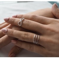 MINET Stříbrný prsten INFINITY s bílými zirkony vel. 64